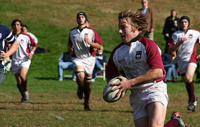 400px boston college rugby running with ball